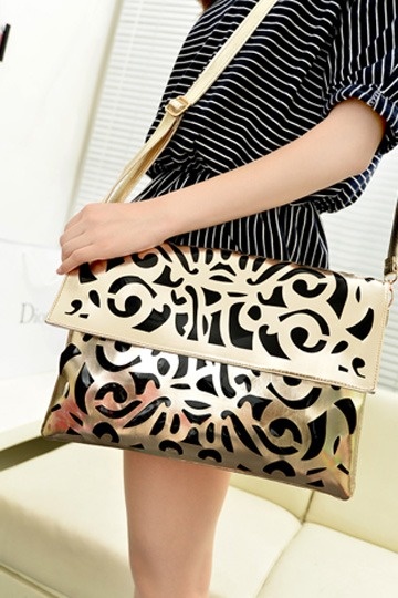 sac bandoulière baroque noir et dorée chic